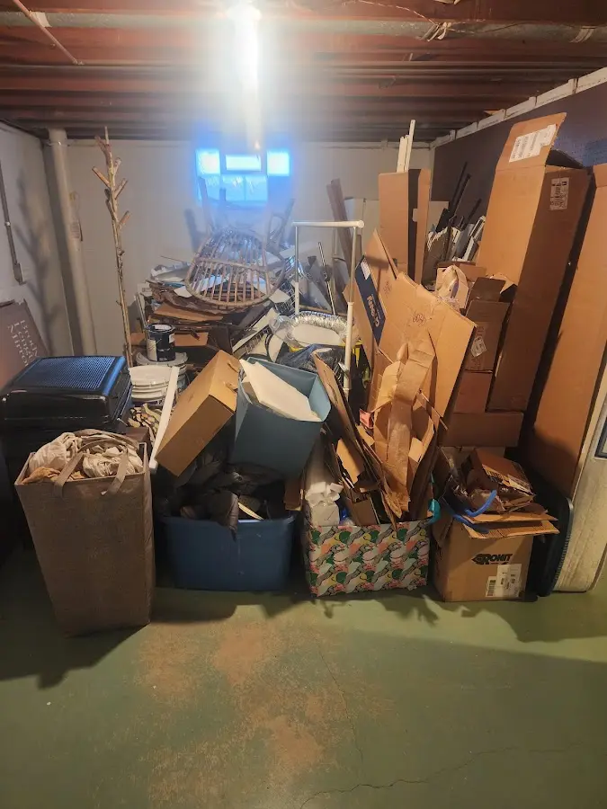 Roll-off dumpster container at job site for Yard Waste Dumpster Rental in Gaines